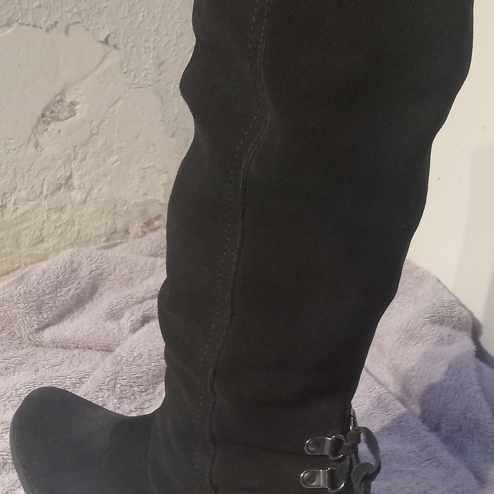 Naughty monkey black leather boots.